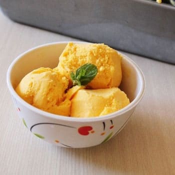 mango ice cream in a cup