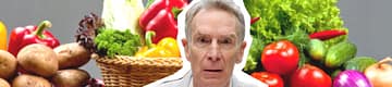 bill nye surrounded by vegetables