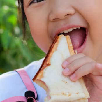 child eating french toast