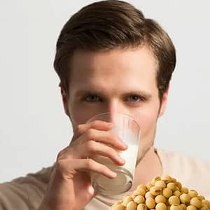 Man drinking soy milk