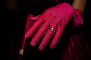 red glove with pretty ring