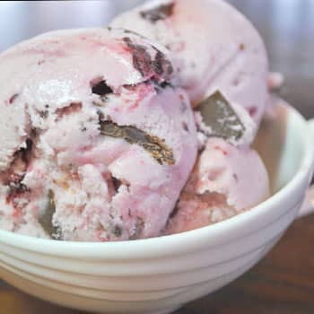cherry pie flavored ice cream in a bowl